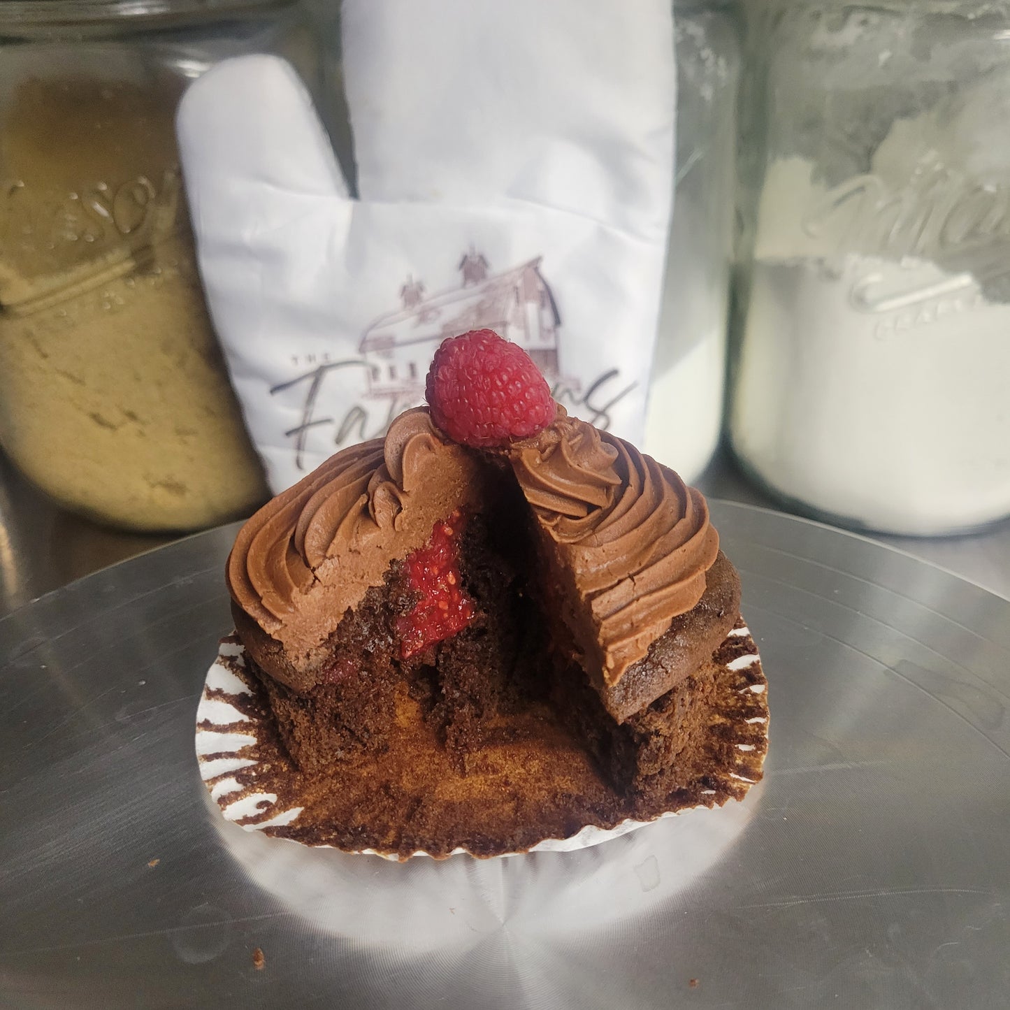 Raspberry filled chocolate butter cream cupcakes we offer 6 and 12